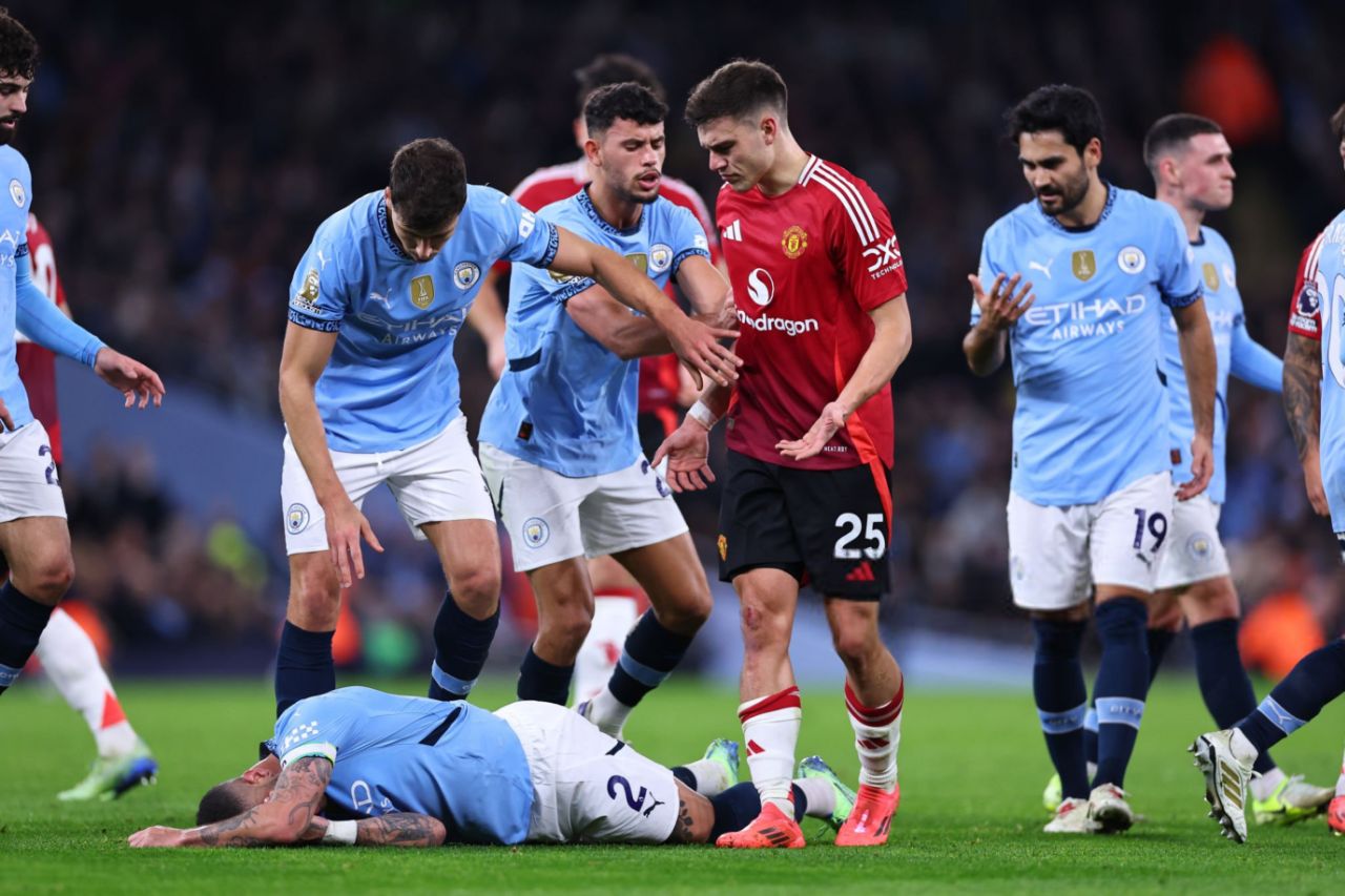 Walker falling to the ground during the derby